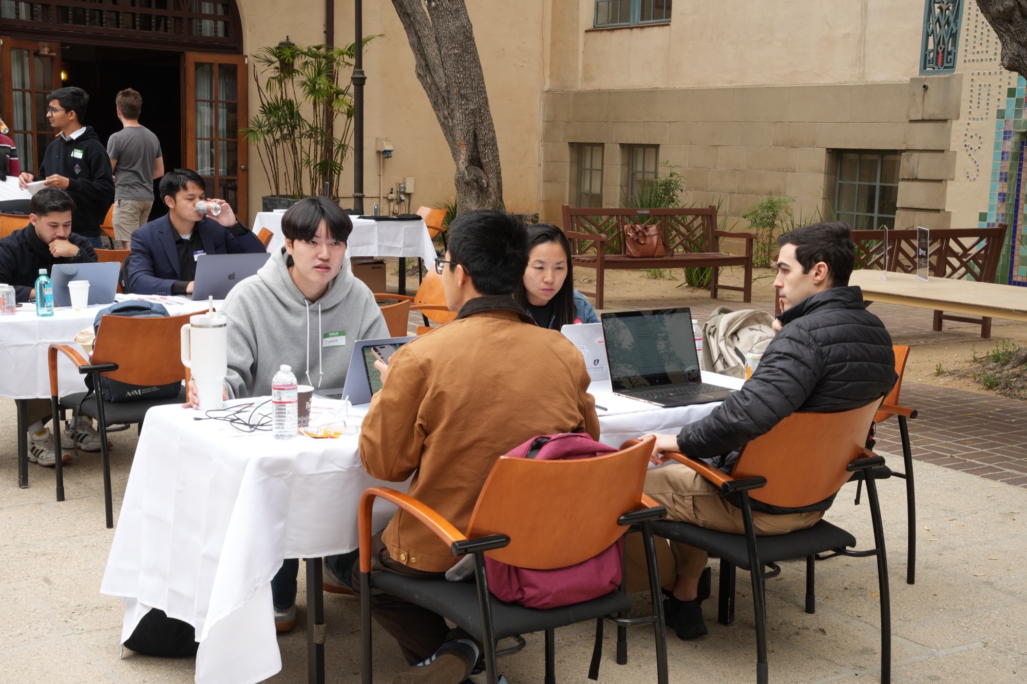 Teams hacking outdoors in the Dabney Hall courtyard