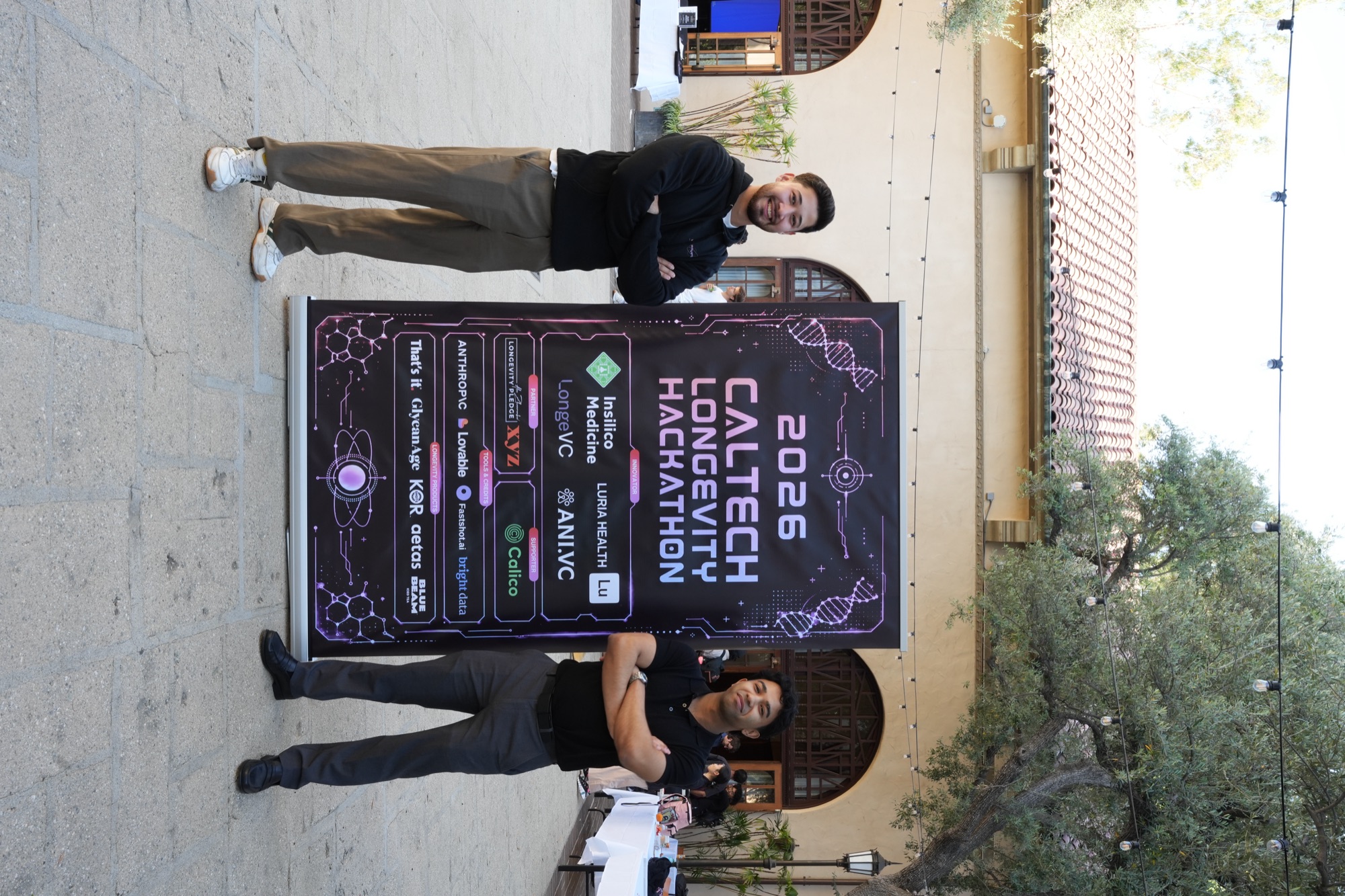 Participants posing at the hackathon backdrop
