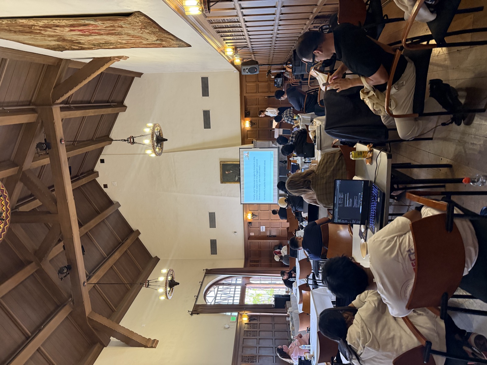 Members engaged during a speaker session in Dabney Hall