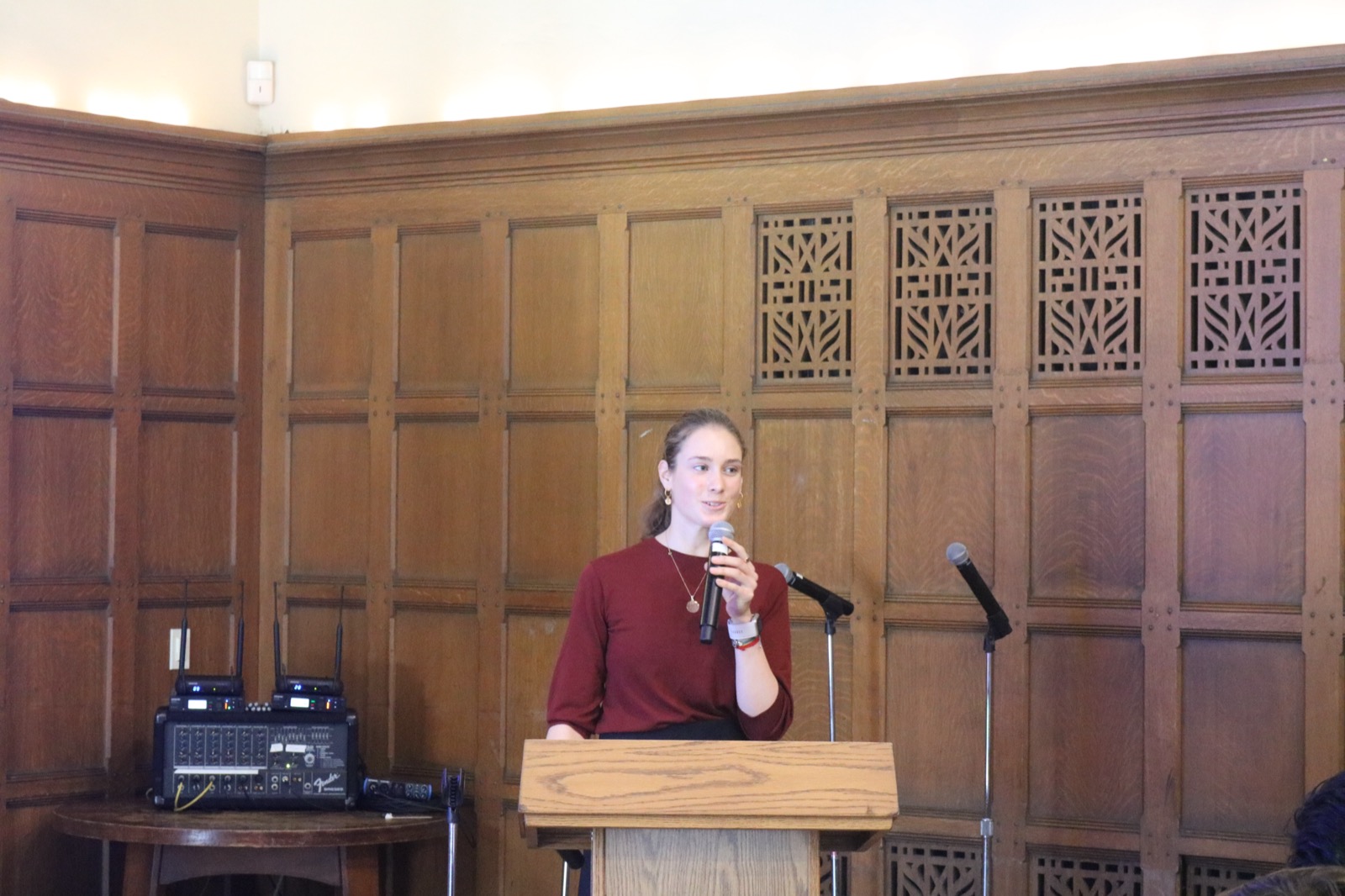 Speaker addressing the club from the Dabney Hall podium