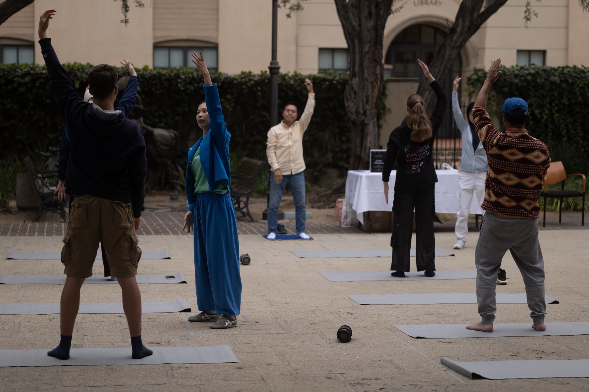 Wen Chen guiding the outdoor movement class on Sunday morning