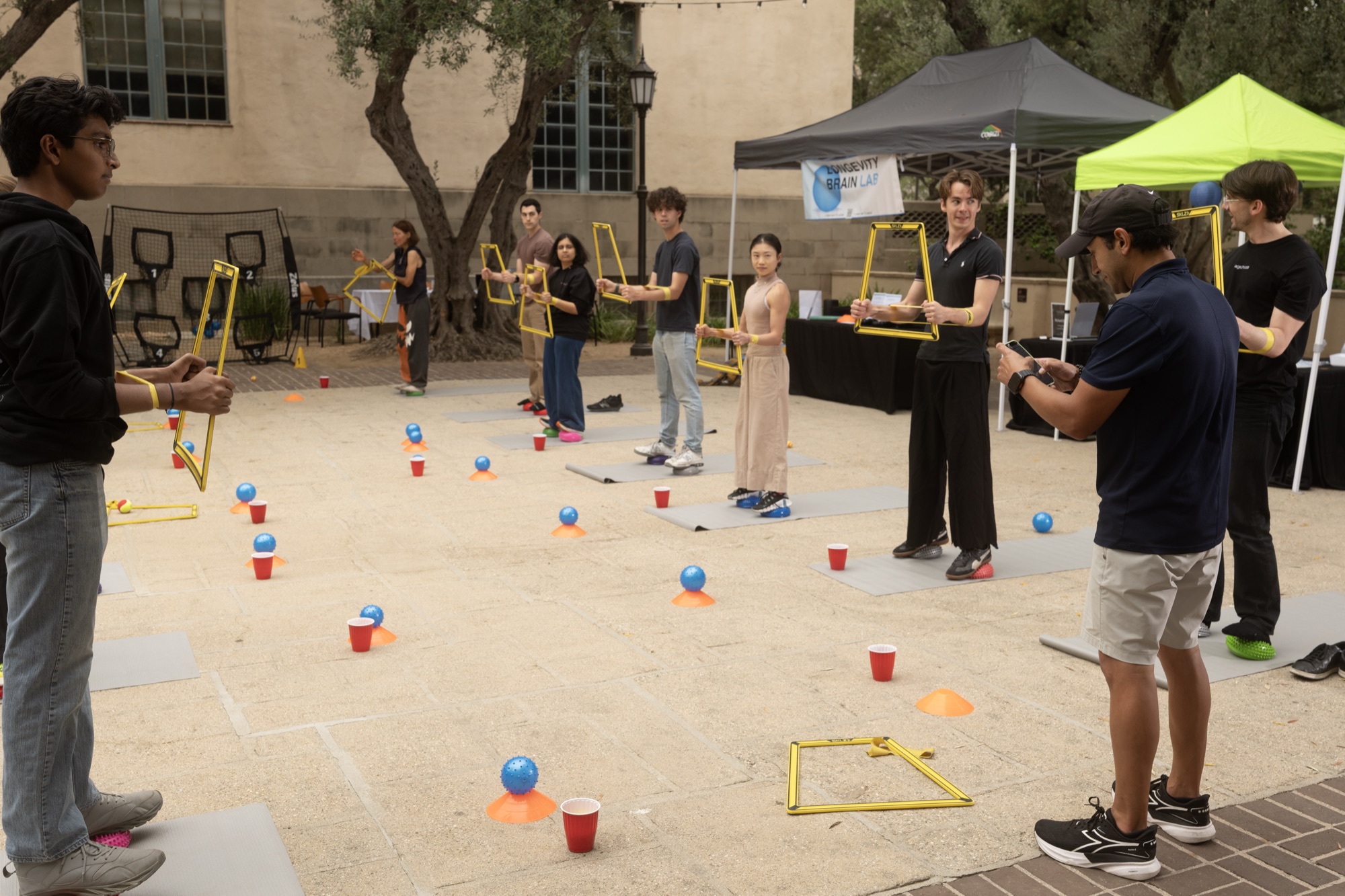 Brain Lab activity — coordination drill with frames and balls