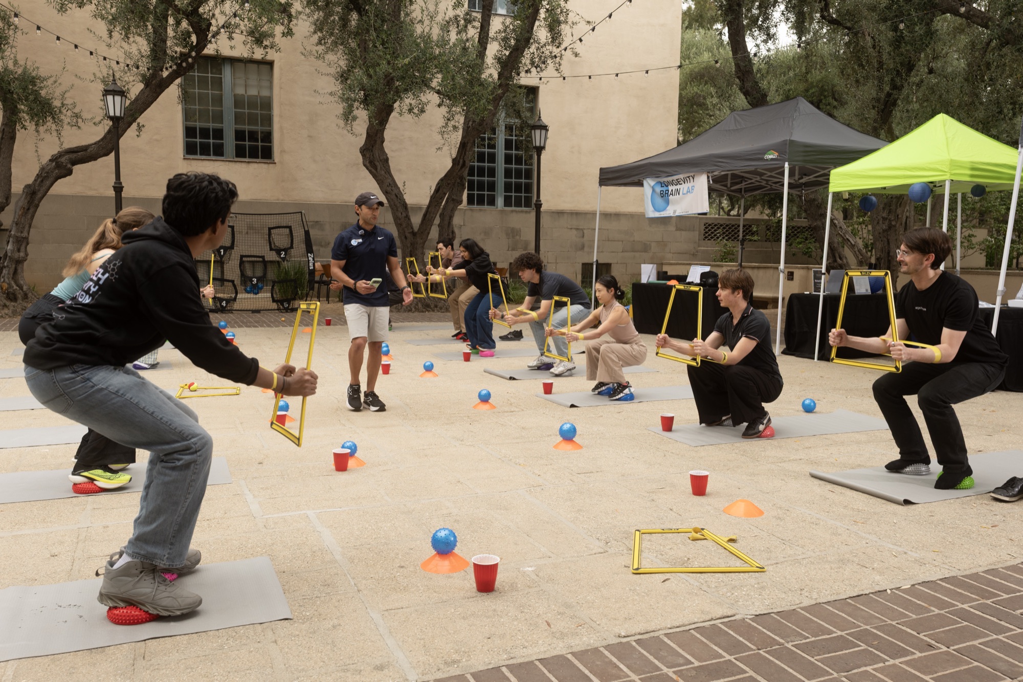 Squatting balance challenge at the Brain Lab station