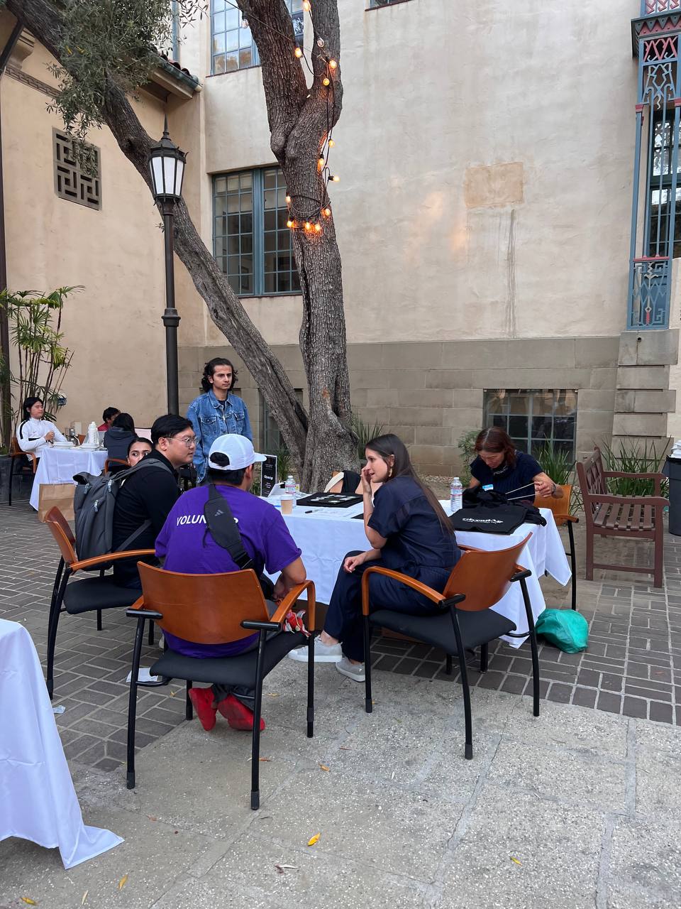 Coffee break in the Dabney Hall courtyard between sessions
